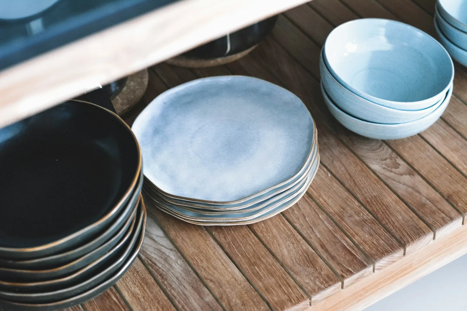 Handcrafted ceramic objects in soft natural light